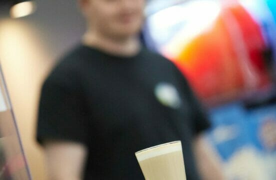 Yeah! Days Out crew member serving a coffee at Stompers Play Gym and TAG X