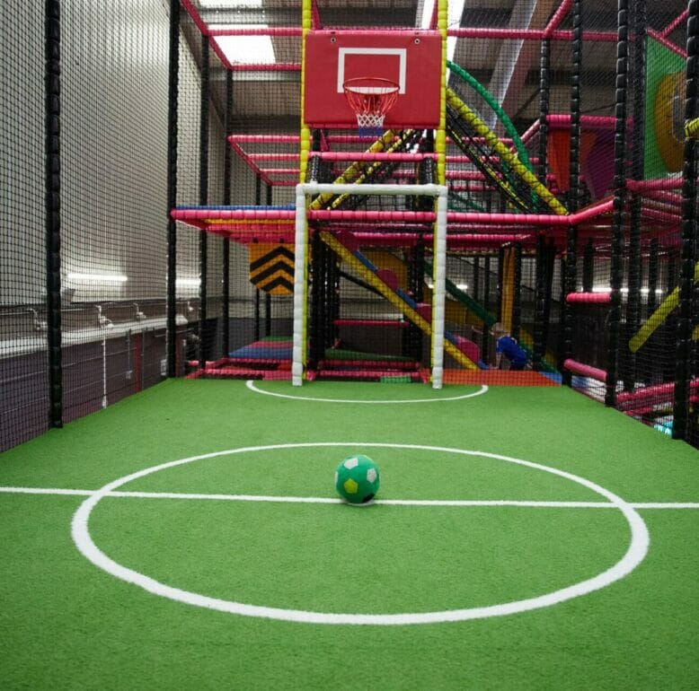 Indoor football court at Stompers Play Gym