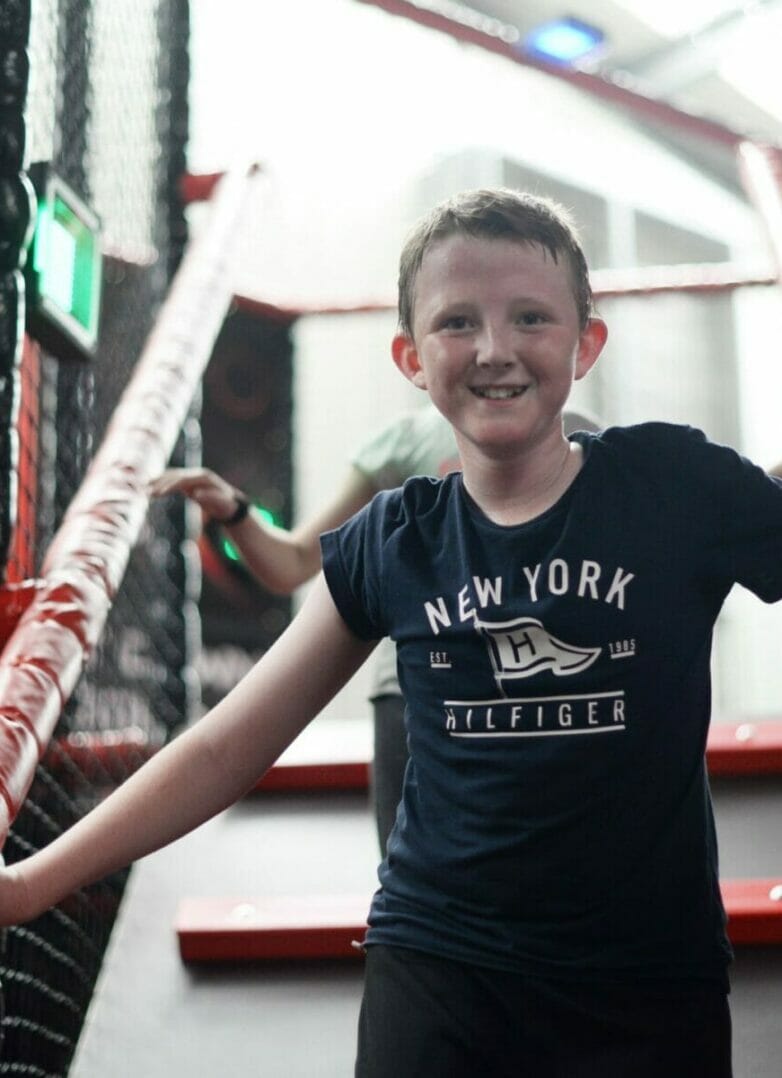 Child enjoying TAG X